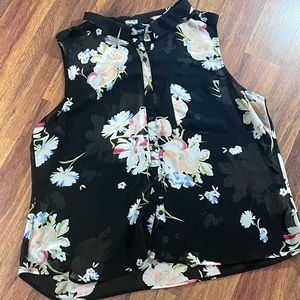 Sheer sleeveless floral print button up top